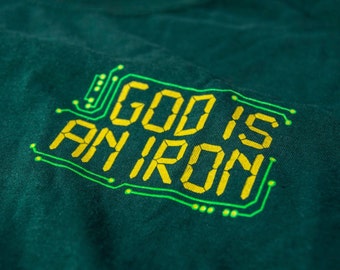 God Is An Iron by Spider Robinson t-shirts