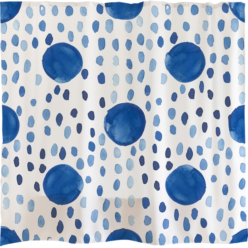 May include: White shower curtain with a blue watercolor polka dot pattern. The dots are of varying sizes and are arranged in a random pattern.