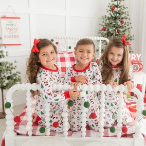 Matching sibling christmas pyjamas sales