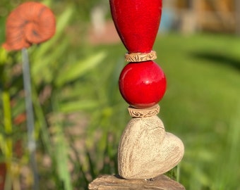 Stele with driftwood - red