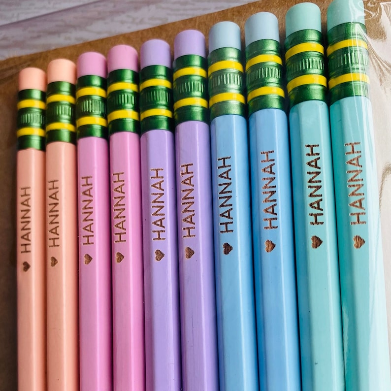 May include: A set of ten pastel colored pencils with the name "HANNAH" engraved on each pencil.