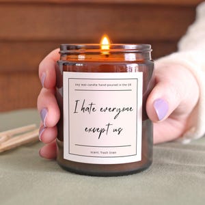 May include: A weathered wooden sign, inscribed with "Welcome to our porch" in white. The sign has a distressed appearance, ideal for adding a touch of rustic charm to a porch or garden.