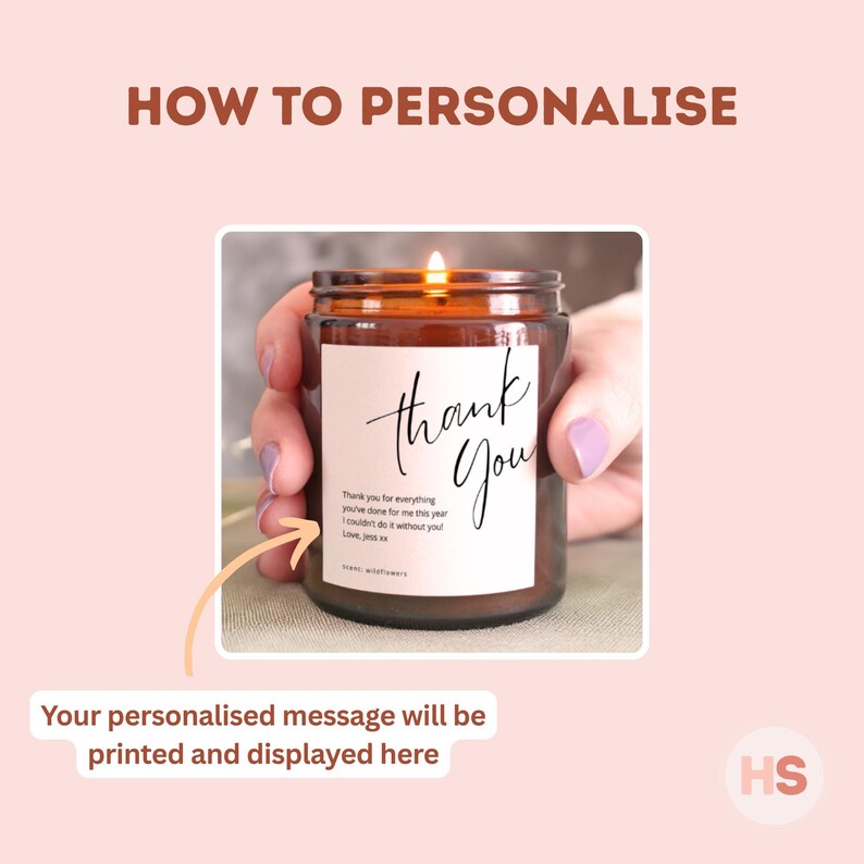 May include: A lit candle in a brown glass jar with a white label that says "thank you". The text "Thank you for everything you've done for me this year. I couldn't do it without you!" is also on the label. The words "How to Personalise" are at the top.