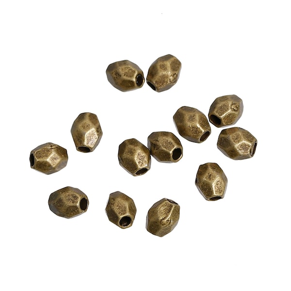100 x Metal Beads Faceted Bronze 4 x 3 mm