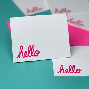 Handmade notecards with the word hello printed in pink