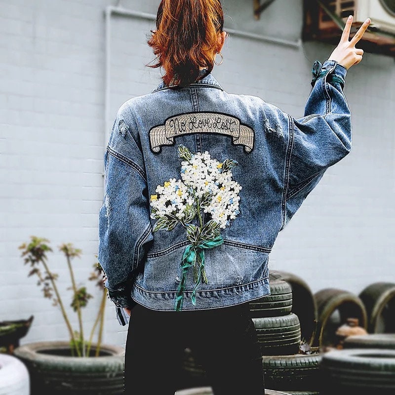 flowers on jean jacket