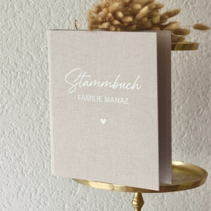 A4 family book with linen cover and white writing