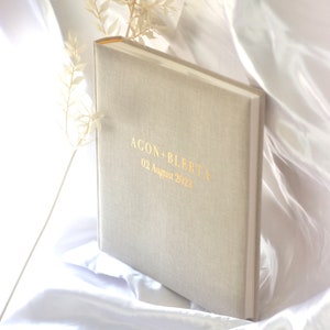 Bruiloft gastenboek/fotoalbum van linnen, minimalistisch, gepersonaliseerd met naam