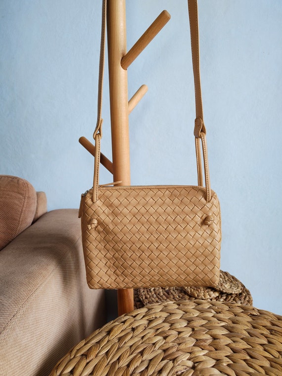 tan woven leather bag