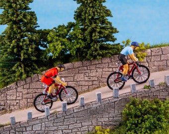 Diorama, miniature racing cyclist on the mountain