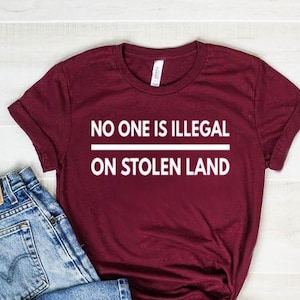 No One Is Illegal On Stolen Land Shirt No Human Is Illegal Shirt Unisex Jersey Short Sleeve Tee