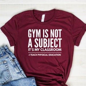 Gym Is Not A Subject It&#39;s My Classroom Shirt Physical Education Teacher Shirt Physical Education Teacher Gift Unisex Jersey Short Sleeve Tee