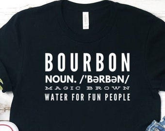 May include: Black t-shirt with white text that reads "BOURBON NOUN. /'BƏRBƏN/ MAGIC BROWN WATER FOR FUN PEOPLE"