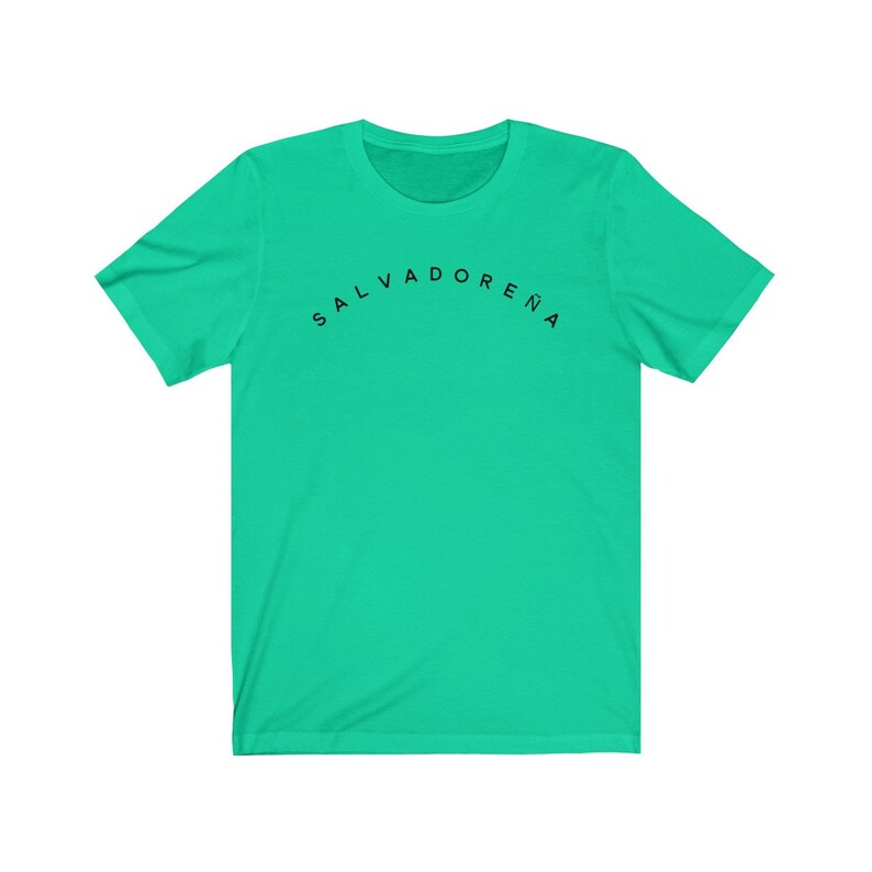 May include: A bright green t-shirt with the text "SALVADORENA" printed in black on the front.