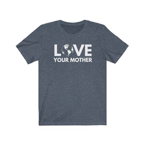 May include: A dark blue t-shirt with a white graphic that says "LOVE" with an image of the Earth in the "O" and "YOUR MOTHER" below.
