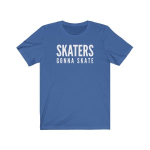 May include: A royal blue t-shirt with white text that reads "SKATERS GONNA SKATE".