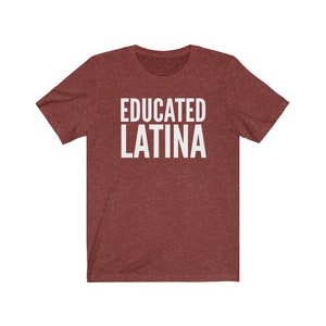 May include: A maroon t-shirt with the text "EDUCATED LATINA" printed in white.