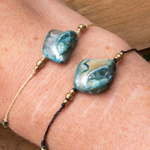 Macrame bracelet with mother of pearl shell bead and brass