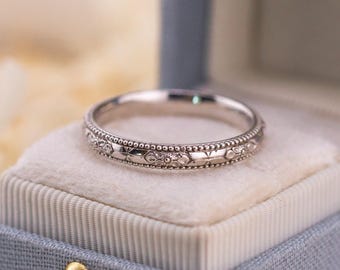 Anillo de boda de oro blanco con flor de naranjo, talla 9