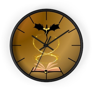 May include: Round wall clock with a black frame and a golden face. The clock face features a black dragon silhouette above an open book, with a swirling golden design. Black hands indicate the time.