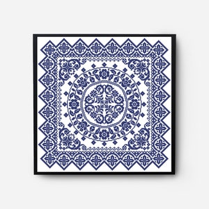 May include: A framed square print with a white background and a navy blue geometric pattern. The pattern is a repeating design of squares, circles, and floral motifs.