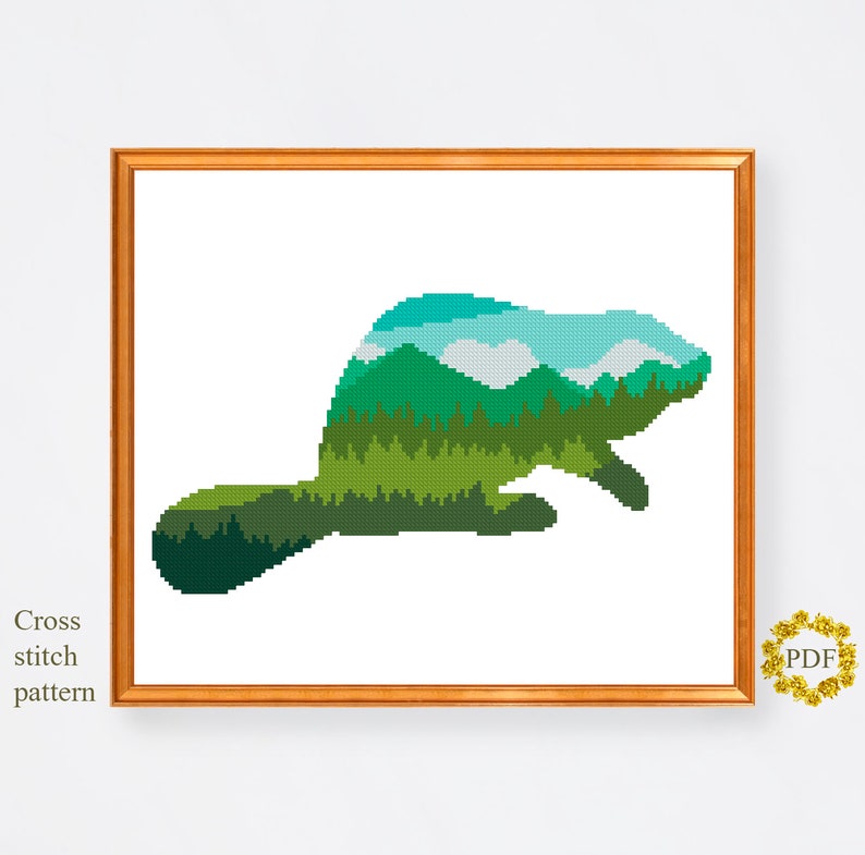 May include: Cross stitch pattern of a beaver silhouette filled with a green forest and blue sky landscape.