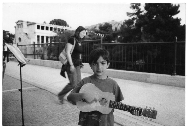 Young musician Greek children playing musical instruments Greece vintage orchestra photo *6924bF little boy playing guitar