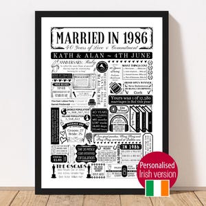 May include: Black framed print titled "MARRIED IN 1986" with text detailing events from that year, including the couple's names and anniversary date. The print includes various facts and figures, with an Irish flag sticker.