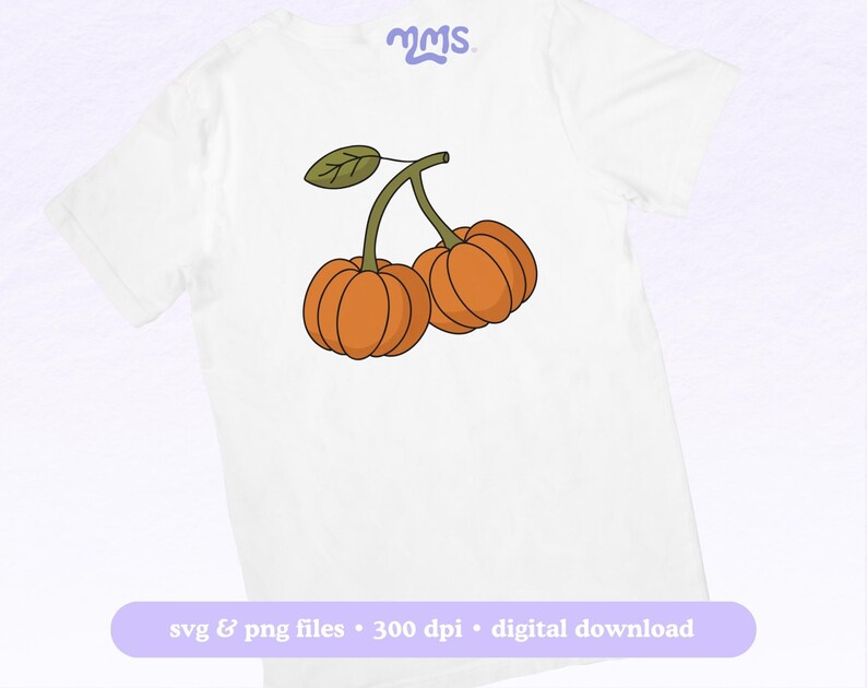 May include: White t-shirt featuring a cartoon illustration of two orange pumpkins connected by a green stem and leaf. The shirt has the text "svg & png files &bull; 300 dpi &bull; digital download" in a purple banner.