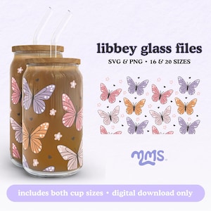 May include: Two brown glass jars with lids and straws, decorated with a butterfly pattern in pink, purple, and orange. The jars are labeled "libbey glass files SVG & PNG 16 & 20 SIZES".