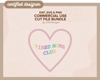 May include: A pink heart with the text "TIRED MOMS CLUB" in rainbow colors. The text is in a retro font style. The image is on a light pink background with a floral pattern.