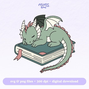 May include: A green dragon with pink wings is curled up asleep on top of a closed book with a pink ribbon. The book has a dark blue cover and white pages.