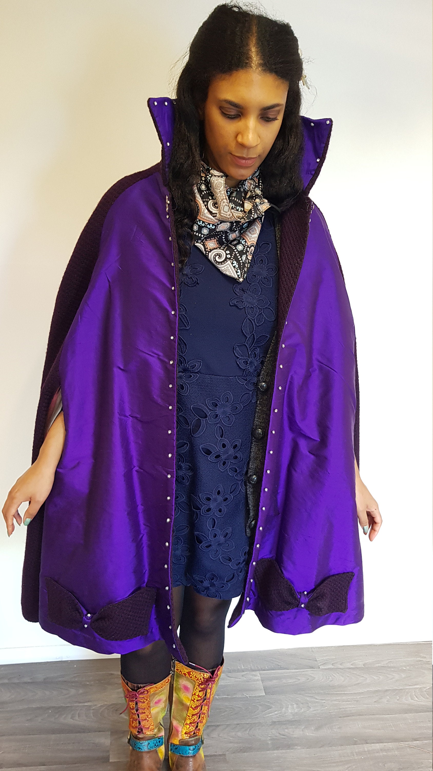 Unique one off handmade cape made from wool and silk with buckle fastening.