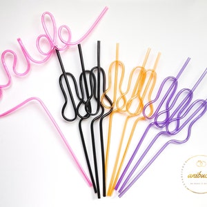 May include: A set of colorful plastic straws shaped into different designs. One straw is shaped to spell out "bride" in pink, while the others are shaped like a hand with the index and pinky fingers extended.