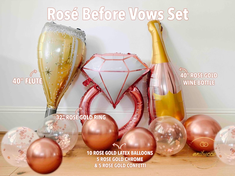May include: A 'Ros&eacute; Before Vows Set' with a 40-inch flute, a 32-inch rose gold ring, a 40-inch rose gold wine bottle, and rose gold balloons. The set includes 10 rose gold latex balloons, 5 rose gold chrome balloons, and 5 rose gold confetti balloons.