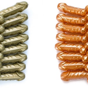May include: A set of 10 gold and rose gold plastic straws with a phallic design. The straws are arranged in two rows, with the gold straws on the left and the rose gold straws on the right. The text "GOLD" and "ROSE GOLD" is printed above each row of straws.