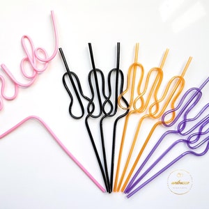 May include: A set of colorful, bendable drinking straws. The straws are shaped into different designs, including the word "bride" in pink. The straws are perfect for adding a fun touch to any party or event.