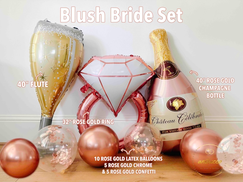 May include: A blush-toned bridal set featuring a 40-inch champagne flute balloon, a 32-inch rose gold ring balloon, and a 40-inch champagne bottle balloon. Includes rose gold latex, chrome, and confetti balloons. The set is designed for a bridal celebration.