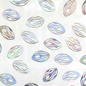 May include: A collection of iridescent silver, oval-shaped, decorative cutouts with a wavy pattern.