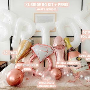 Extra large white letters spelling BRIDE hang above the bed in an arch. Below the letters on the bed rests four large complementing foil balloons, a large flute, a rose gold ring, champagne bottle and 10 rose gold chrome and confetti filled balloons