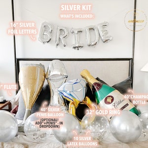 May include: A silver bridal shower party decoration kit with a 40-inch champagne bottle balloon, a 40-inch flute balloon, a 40-inch silver penis balloon, a 32-inch gold ring balloon, a diamond-shaped balloon, 10 silver latex balloons, and a 16-inch silver foil letter banner that reads "BRIDE".