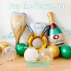 May include: A festive party decoration set labeled "Pop the Veuve Set" includes a 40-inch champagne flute, a 32-inch gold ring, and a 40-inch champagne bottle balloon. The set also features gold, green, white, and confetti balloons.
