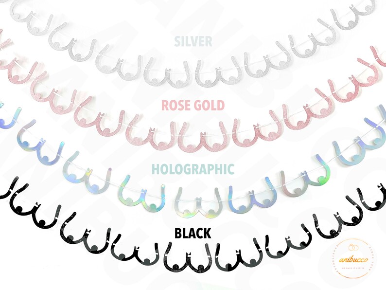 Peut inclure: Une guirlande de d&eacute;coupes en papier en forme de seins dans quatre couleurs&nbsp;: argent, or rose, holographique et noir. La guirlande est enfil&eacute;e sur une ficelle blanche.
