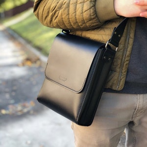 Mens mini messenger bag. Black leather shoulder bag