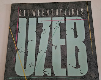 UZEB – Between The Lines - EX - Lp records - Wl-027 - Paroles & Musique Records - 1988 Canada records - Rock album LP - Lp vinyl album