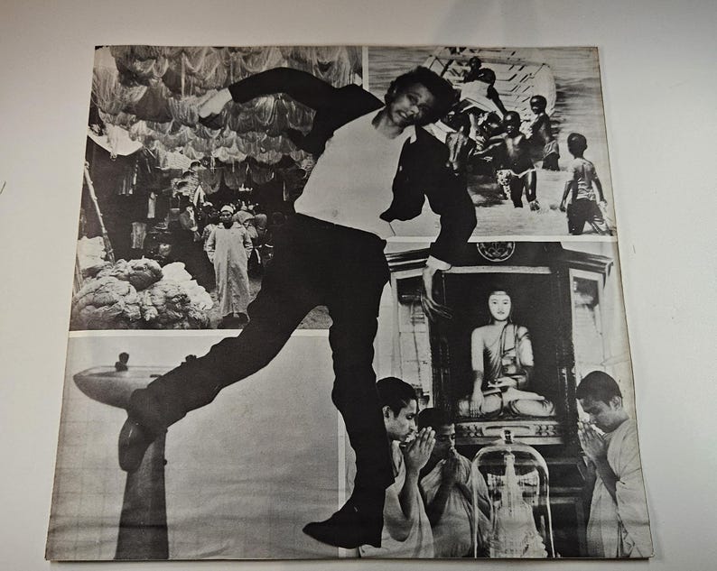 May include: Black and white photograph of a man in motion, superimposed over multiple images. The man is wearing a white shirt, black pants, and a black jacket. The background includes scenes of people and religious imagery.