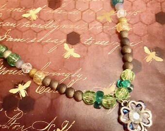 Four Leaf Clover Pendant St Patrick's Day Green, Gold and Black Beaded Necklace by Lauren Jay Designs