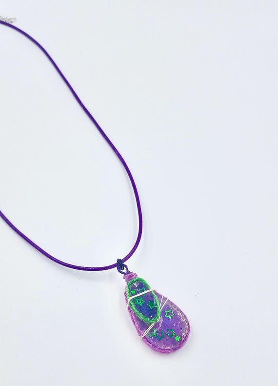 Purple Resin Green Star Teardrop Pendant With Silver Wire Wrapped Detail Purple Cord Necklace by Lauren Jay Designs