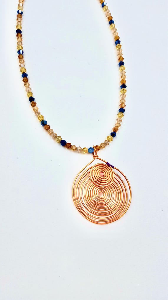 Copper Sun Spiral Pendant Gold and Black Beaded Necklace by Lauren Jay Designs