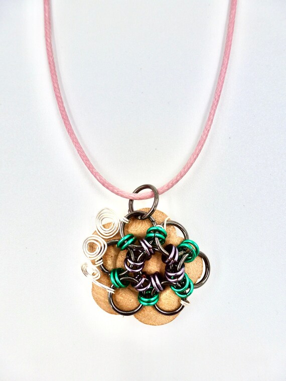 Chainmail Wooden Flower Button Pendant With Silver Wire Wrapped Spiral Detail on Pink Cord Necklace by Lauren Jay Designs